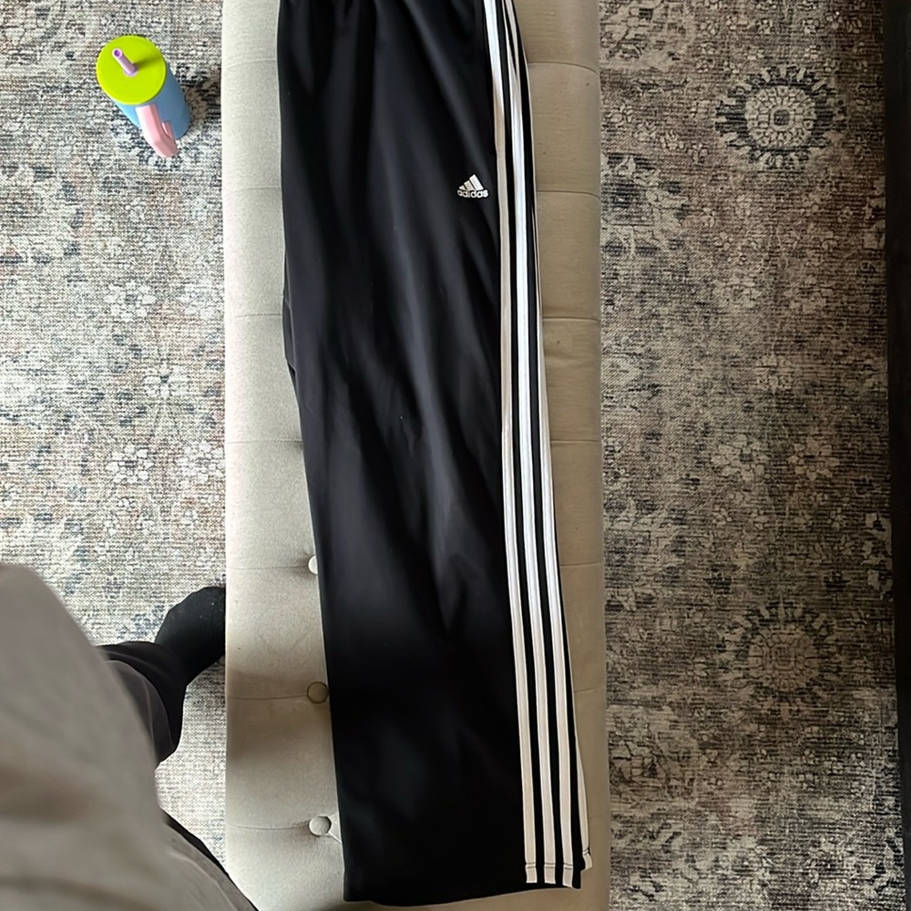 Men’s black medium Adidas pants. Lightly worn, only have been worn indoors.